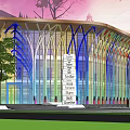 Modern Library Building With Colorful Glass Curved Structure And Green Lawn Trees