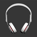 White Over Ear Headphones With Red Accents On Black Background