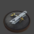 White And Yellow Model Airplane With Black Crosses On Round Gray Base