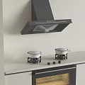 Modern Kitchen Appliances With Range Hood Cooktop And Pots On Countertop