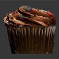 Delicious Cupcake With Brown Frosting And Colorful Sprinkles On Paper Cup