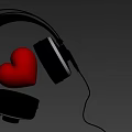 Stylish Black Headphones With Red Heart Placed On Vintage Wooden Surface