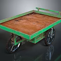 Unique Vintage Green Cart With Weathered Wooden Surface And Metal Wheels