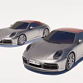 Two Silver Porsche Convertible Sports Cars With Red Tops And Different License Plates
