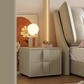Modern Beige Nightstand With Round Lamp Books And Bedside Artwork
