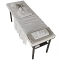 Massage Bed Featuring White Sheets Folded Towels Bath Towels And Side Shelf 3d model
