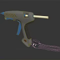 Gray Glue Gun With Blue Handle White Glue Stick And Black Power Cord