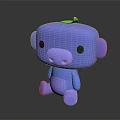 Blue Cartoon Monkey Toy with Green Leaf on Head Sitting on Black Surface with Reflection