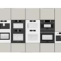 Multiple Kitchen Ovens Neatly Arranged In White Cabinets For Modern Kitchen 3d model