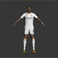 Football Player Wearing White Jersey With Fly Emirates Logo And Number 11 In Yellow Cleats