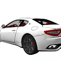 White Maserati Sports Car With Red Leather Seats And Black Alloy Wheels