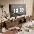 Modern TV Stand With Flat Screen TV Potted Plants Decorative Items And Area Rug