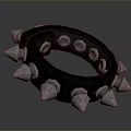 Black Ring Shaped Lifestyle Accessory With Silver Spikes And Metal Bolts