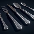 Elegant Silver Cutlery Set Featuring Forks Knives Spoons And Decorative Handles On Dark Background