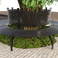 Circular Tree Pit With Black Metal Bench Surrounding Trunk And Green Vegetation On Paved Ground