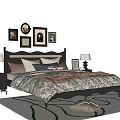 Cozy Double Bed with Decorative Wall Art Bedside Tables Table Lamps and Area Rug
