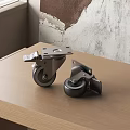 Durable Metal Caster Wheels On Wooden Tabletop With Distressed Wall Background