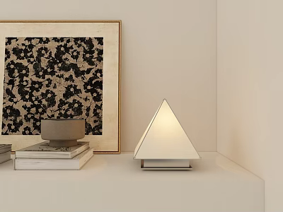 Modern Triangle Table Lamp on White Shelf with Stacked Books and Framed Decorative Painting 3d model