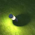 Outdoor Light Brightly Shining on Green Grass Casting Warm Glow with Black Housing