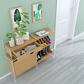 Modern Shoe Cabinet With Multiple Storage Shelves Decorative Plants And Colorful Shoes