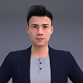 Portrait of a man wearing dark blue blazer and gray T-shirt against gray background