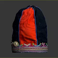 Traditional Red And Blue Hat With Colorful Trim And Circular Ornaments