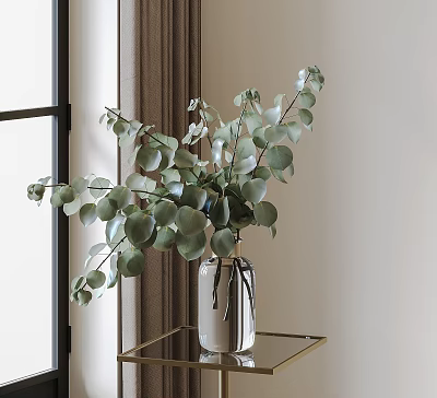 Transparent Vase with Lush Green Eucalyptus Leaves on Gold Frame Glass Table by Window 3d model