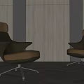 Two Modern Office Chairs With Brown Leather Seats And Black Metal Bases
