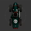 Vintage Green Racing Car Model With Number 63 Driver Black Helmet Goggles And Large Wheels