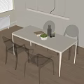 Modern White Dining Table Set With Transparent Chairs Golden Legs And Green Fruit Bowl