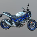 Modern Black and Blue Motorcycle with Sleek Design Sporty Body Black Seat and Blue Wheels