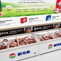 Vibrant Red Streetside Convenience Store Exterior With Clear Glass Entrance And Neat Product Display Shelves