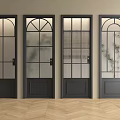 Five Black Hinged Doors With Various Glass Designs In Light Colored Walls And Wooden Floor
