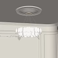 Elegant White Chandelier with Petal Design Hanging In Room With Decorative Ceiling And Wall Moldings