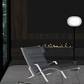 Modern Black Leather Lounge Chair In Minimalist Interior With Floor Lamp Fireplace And Window Trees