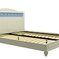 White Double Bed With Blue Scalloped Decorative Headboard And Gold Slatted Base