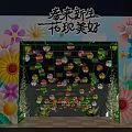 Floral Decor Archway With Colorful Lanterns Illuminated Lights Green Plants And Brick Pathway