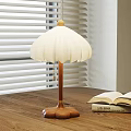 Wooden Table Lamp With White Pleated Shade On Wooden Desk By Window With Blinds