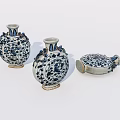 Traditional Blue And White Ceramic Vessels With Floral Patterns And Vase Shapes