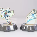 Two Decorative Robot And Character Figurines On Silver Base Display Items 3d model