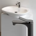 Modern White Countertop Washbasin with Sleek Black Faucet in Minimalist Bathroom Interior