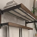 Wall Mounted Wooden Metal Bathroom Shelf With Folded Towels Near Round Mirror And Green Plant
