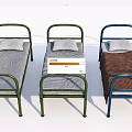 Three Single Beds With Metal Frames Gray Mattresses White Pillows And Brown Blanket