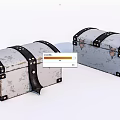 Two Distressed Vintage White Trunks With Black Leather Straps And Rivets