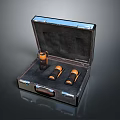 Open Black Leather Case With Three Weapons Yellow And Black Cylindrical Design