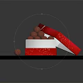 Red Decorative Open Box Filled With Chocolate Truffles On Dark Surface 3d model
