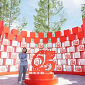 Popular Photo Spot With Red 65 Sculpture Surrounded By Red Wall And Display Frames