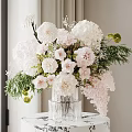 Transparent Crystal Vase With White Pink Flowers Hydrangea Dahlia And Green Foliage On Marble Table