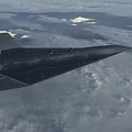 Sleek Black Fighter Jet Flying High Above Clouds Showcasing Advanced Aerodynamic Design