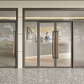 Modern Glass Double Doors Entrance With Metal Frames And Textured Flooring